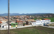 Outskirts of Roda de Ter, and trucks, viewed from la Muntanyeta