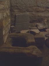 Cross-bases and other stone fragments from inside the blind stairwell in the crypt of St Mary's Lastingham