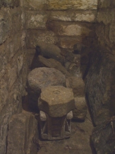 Stone fragments stored in the blind stairwell of the crypt at St Mary's Lastingham