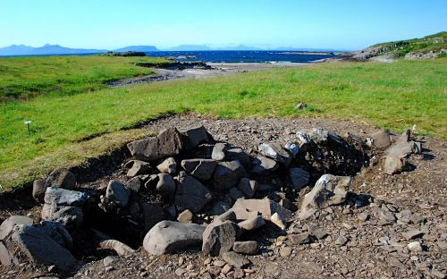 The reconstructed ship setting of the Ardnamurchan boat burial, published to Wikimedia Commons under a Creative Commons license by Jon Haylett of A Kilchoan Diary