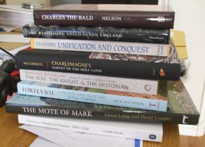 A stack of books bought at Leeds IMC 2013