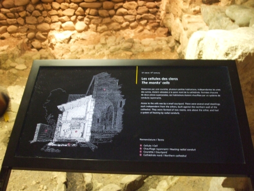 Signage for the "monks' cells" (cellules des clercs) outside the oldest cathedral at the site of Saint-Pierre de Genève