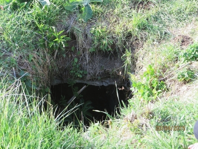 Roofed hole in the ground of the Pla del Castell de Tona