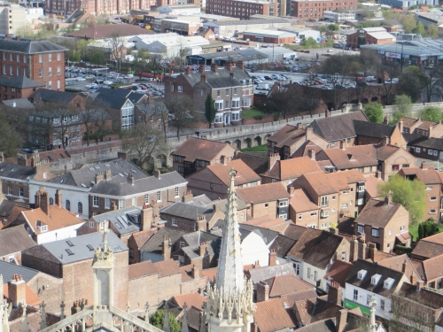 View down onto York from the Minster tower, with the restored Roman walls visible across the centre