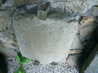 Fragmentary Class I symbol stone at Rhynie Old Kirk