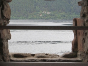 View of Loch Ness through the windows of the domestic buildings in the newer part of Urquhart Castle