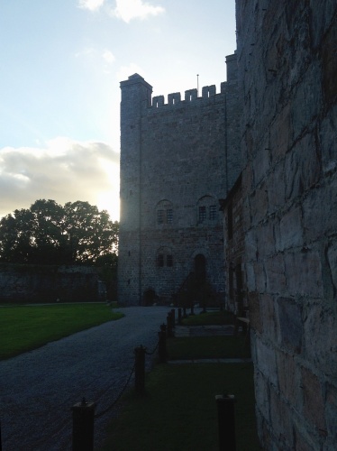 The Keep at Appleby Castle at sunset, seen from beside the curtain wall and gate